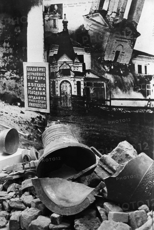 A display depicting the persecution of the church during the post-revolutionary period in russia, the poster reads 'every pound of church silver is worth 25 poods (old russian weight measure - aprox, 410 kg) of bread for the hungry, give the gold and silver to the dying,' this was part of an exhibition, held in vladimir in june, 1991.