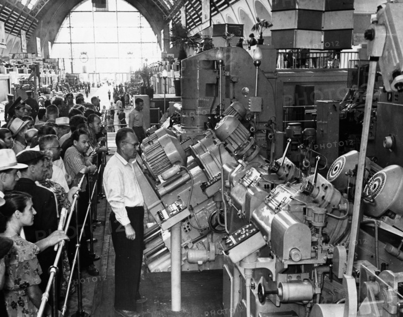 A machine that produces bushings for harvesters' cutting devices on display in the central hall of the ussr economic achievements exhibition in moscow ussr 1959.