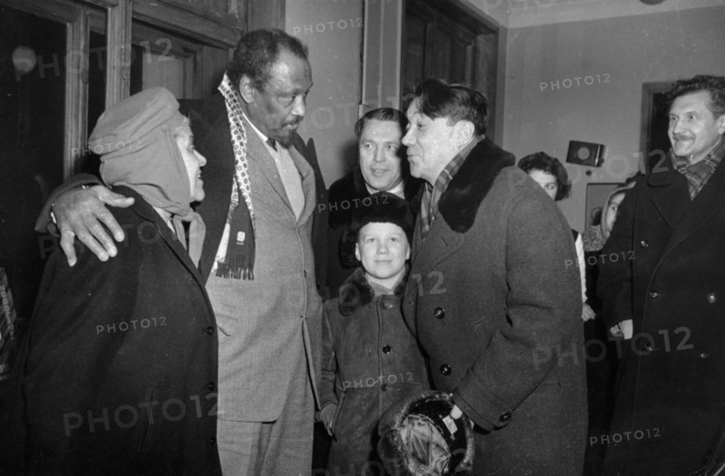 Paul robeson and his wife eslanda being greeted at vnukovo airport by m, kotov, executive secretary of the soviet peace committee, and soviet writers b, polevoi and v, zakharchenko, moscow, ussr, january 18, 1960.