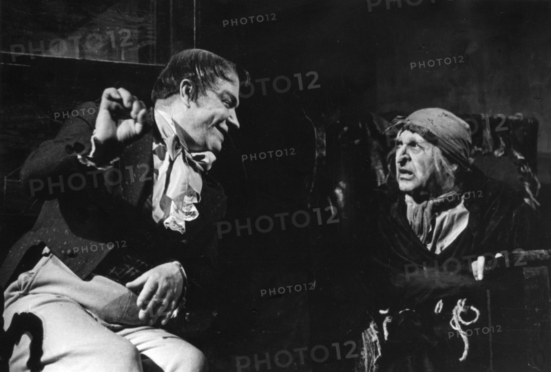 A scene from 'dead souls' adapted from gogol's story, v,v, belokurov as chichikov (left) and b, petker as plushkin, moscow art theatre production, 1965.