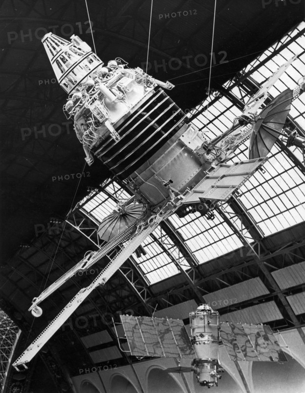 The molniya 1 telecommunications satellite - a new installation at the cosmos pavillion of the ussr economic achievements exhibition in moscow (vdnkh), may 1970.
