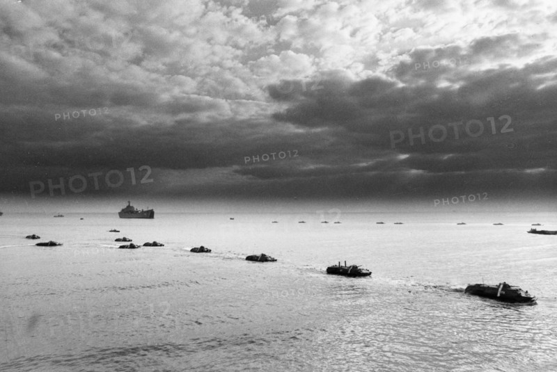 Soviet military exercises, amphibious apcs disembarking from aboard landing ships, october 1988.