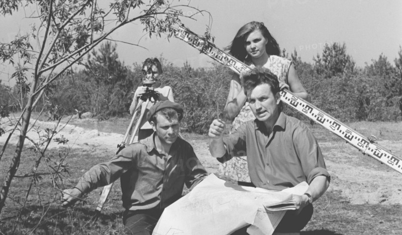 Kiev region, ukrainian ssr, ussr, a group of geodesists measuring the territory at the construction site of the chernobyl nuclear power plant, june 6, 1971, l-r: mikhail chikalovets, vladimir slobodenyuk (second ground), anna lokhanko, lyubov rudenok.
