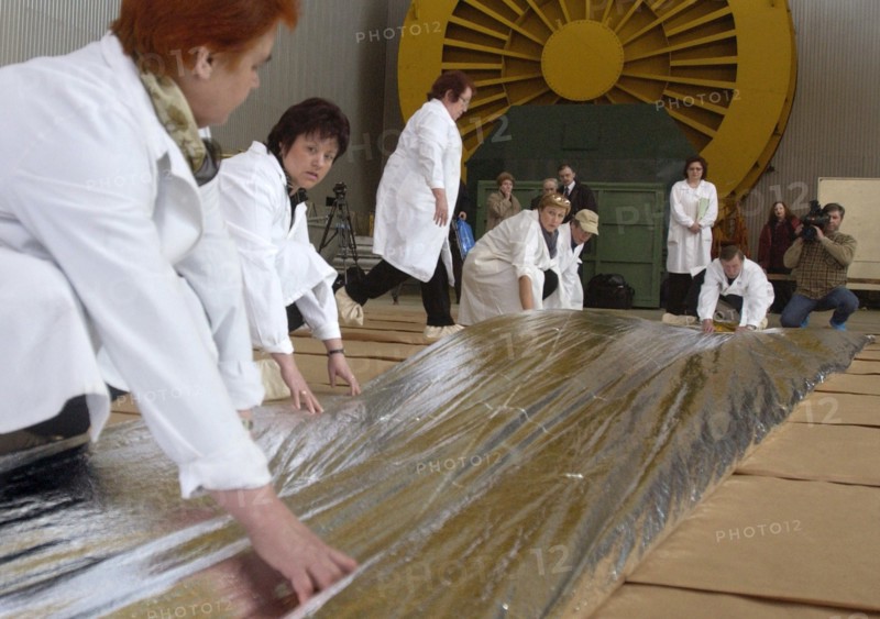 Specialists of lavochkin scientific production association are packing a part of sunlight-propelled solar sail spacecraft while preparing it for the launch, moscow region, russia, april 7, 2004.