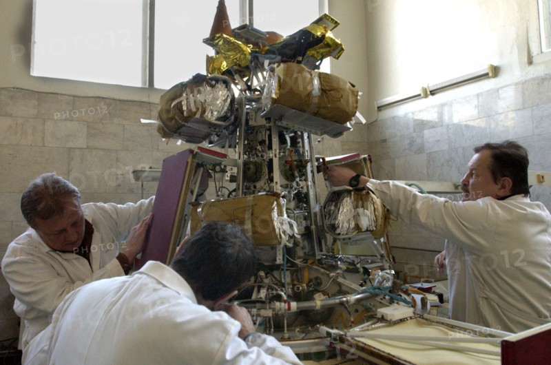 Specialists of lavochkin scientific production association prepare sunlight-propelled solar sail spacecraft for its launch, moscow region, russia, april 7, 2004.