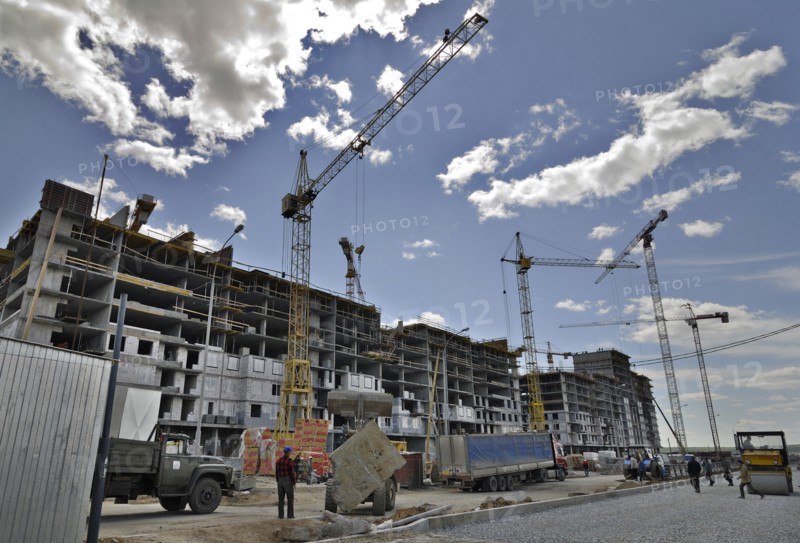 Yekaterinburg, russia, october 7, 2011, apartment block under construction at akademichesky housing development, in the city of yekaterinburg, according to renova stroi group, the company managing the project, akademichesky is largest construction project of its kind in russia and europe, the housing development covers an area of 1300 hectares and will house 325 thousand residents upon its completion.