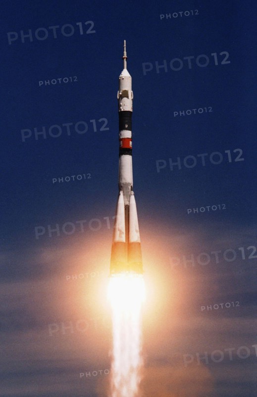 Baikonur launch pad, kazakhstan , april 28, 2001, a soyuz rocket with world's first space tourist, dennis tito, seen being successfully blasted off from baikonur space port, a soyuz tm space vehicle will take talgat musabayev, yuri baturin and the u,s, multi-millionaire to the international space station, the docking with the iss has been scheduled for monday.