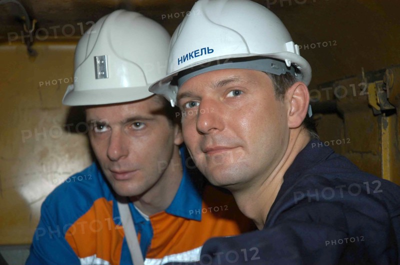 Norilsk, russia, march 21, norilsk nickel ceo mikhail prokhorov and companyi´s future ceo denis morozov, l-r, tour the oktyabrsky mine of the norilsk nickel.