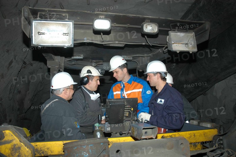 Norilsk, russia, march 21, 2007, norilsk nickel ceo mikhail prokhorov, second from right, and companyi´s future ceo denis morozov, right, talk to miners while touring the oktyabrsky mine of the norilsk nickel.