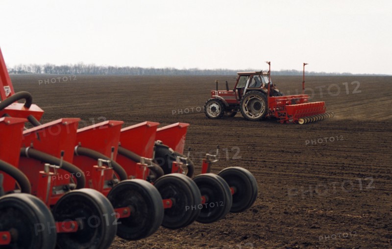Tractors sowing sugar beets on a farm owned by the agris agricultural company in the novoalexandrovsk district, stavropol territory, russia, late 1990s.