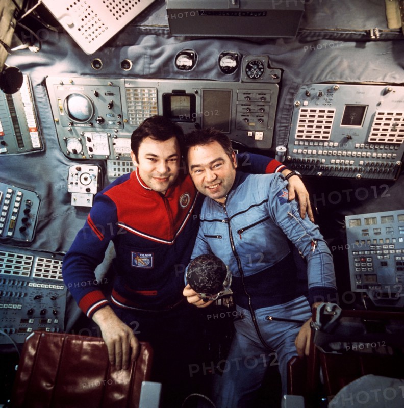 Soviet cosmonauts yuri romanenko (left) and georgi grechko aboard the salyut 6 space station, docked with soyuz 26 and 27, 1978.