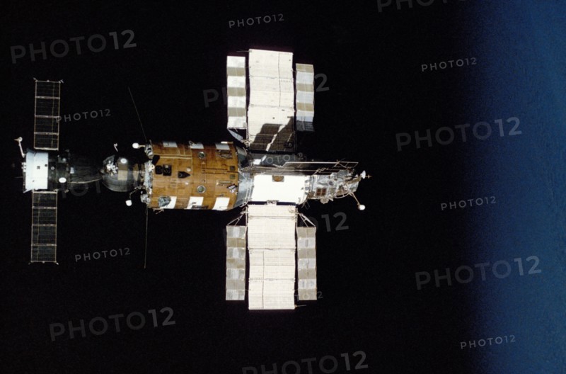 Soviet spacecraft soyuz t-14 docked to the salyut 7 space station after undocking with the soyuz t-13 cargo craft, november 1985, photo taken from soyuz t-13.