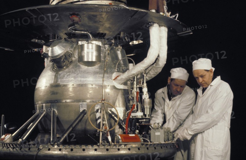 V,i, yegorov and n,i, antoshin, veterans of the soviet space industry, assembling the venera 13 or 14 space probe in 1981.