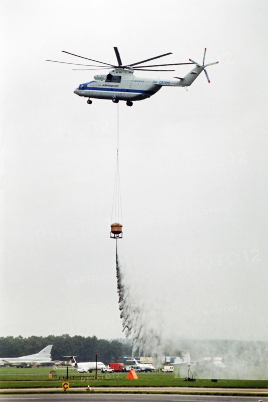 A russian mi-26 helicopter - the world's biggest - demonstrating it's fire-fighting capabilities at the farnborough air show in 1992.