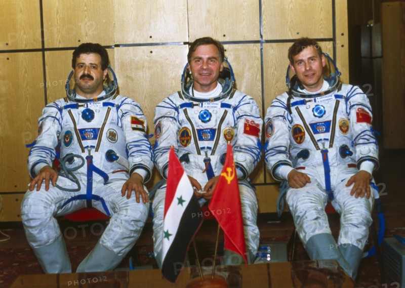 Soyuz tm-3, cosmonauts muhammed faris (syria), aleksandr viktorenko, and aleksandr pavlovich aleksandrov prior to their flight, 1987.