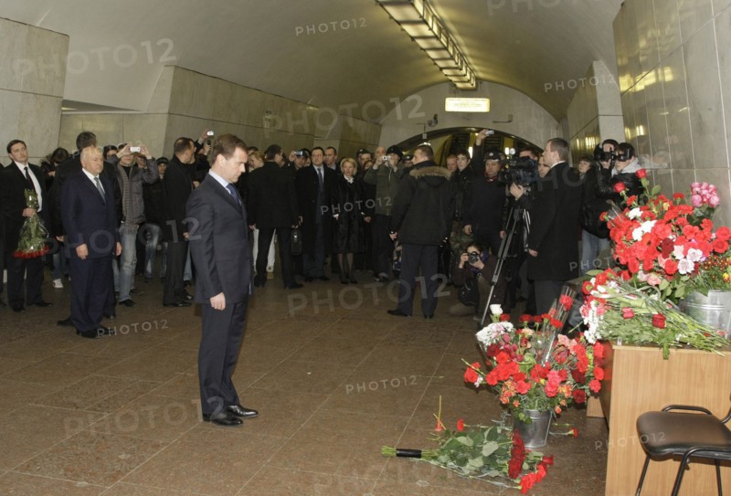 Moscow, russia, march 29, 2010, president of russia dmitry medvedev mourns at lubyanka moscow metro station, where he laid flowers at the scene of today’s suicide bombing, blasts rocked two stations on sokolnicheskaya line of the moscow underground during the rush hour killing 38 and injuring over 60 passengers.