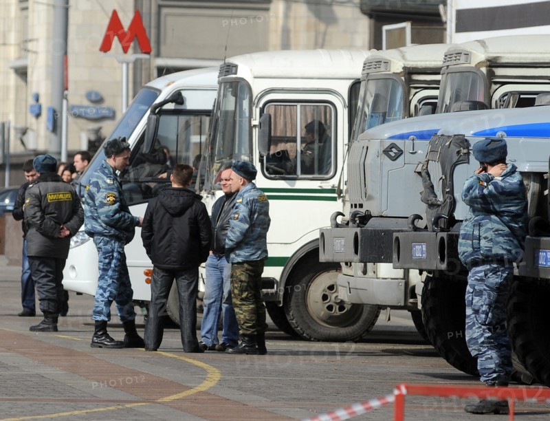 Moscow, russia, march 30, 2010, omon riot police officers patrol an area outside okhotny ryad metro station, on monday 29 march 2010, moscow's underground became the target of suicide bombings in which more than thirty commuters were killed.