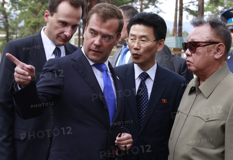 Ulan-ude, russia, august 24, 2011, russia's president dmitry medvedev and kim jong-il (kim jong il), the leader of the democratic people's republic of korea (north korea), the chairman of the national defense commission, general secretary of the workers' party of korea, l-r front, meet at sosnovy bor (pine tree forest) military post in ulan-ude.