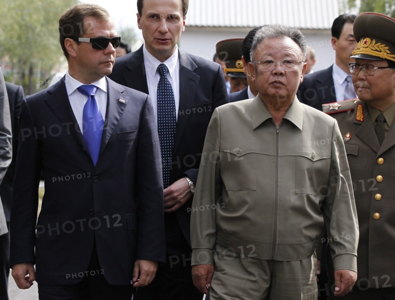 Ulan-ude, russia, august 24, 2011, russia's president dmitry medvedev and kim jong-il (kim jong il), the leader of the democratic people's republic of korea (north korea), the chairman of the national defense commission, general secretary of the workers' party of korea, l-r front, meet at sosnovy bor (pine tree forest) military post in ulan-ude.