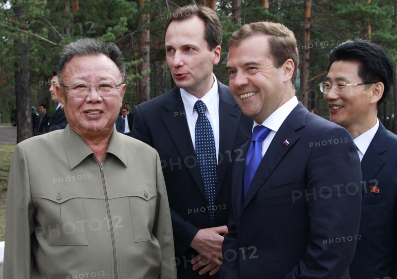 Ulan-ude, russia, august 24, 2011, russia's president dmitry medvedev and kim jong-il (kim jong il), the leader of the democratic people's republic of korea (north korea), the chairman of the national defense commission, general secretary of the workers' party of korea, r-l front, meet at sosnovy bor (pine tree forest) military post in ulan-ude.