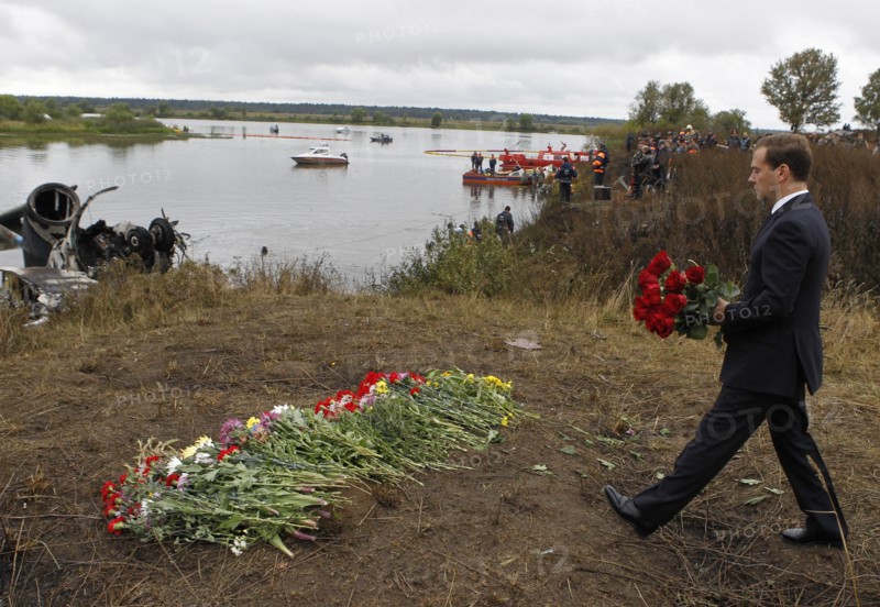 Yaroslavl region, russia, september 8, 2011, president of russia dmitry medvedev laying flowers at the site of the yak-42 plane crash which took the lives of lokomotiv ice hockey team players and coaches.