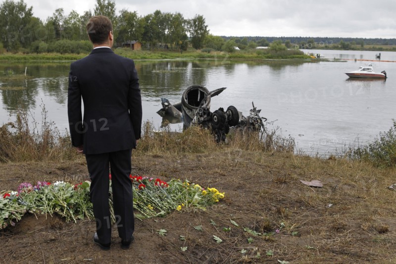 Yaroslavl region, russia, september 8, 2011, president of russia dmitry medvedev laying flowers at the site of the yak-42 plane crash which took the lives of lokomotiv ice hockey team players and coaches.