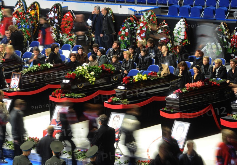 Yaroslavl, russia, september 11, 2011,people paying their last respects to the lokomotiv ice hockey players killed in a plane crash on september 7.