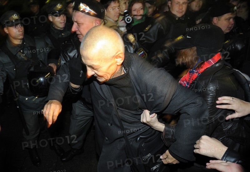 Moscow, russia, october 12, 2011, left front movement’s coordinator konstantin kosyakin being detained as demonstrators tried to break a police cordon during an authorised day of wrath protest in triumfalnaya square.