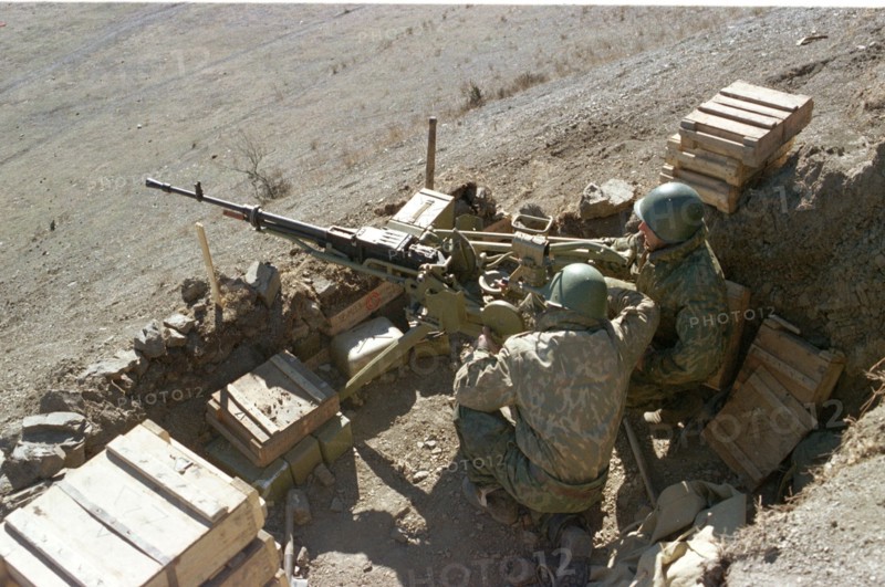 A machinegun emplacement of the itum-kale russian borderguards detachment stationed in the south of argun ravine in chechnya where the antiterrorist operation is in full swing now, the russian borderguards secure the chechen part of the russian- georgian frontier from any breaking through of the armed bandits, chechnya, russia, february 24, 2000.