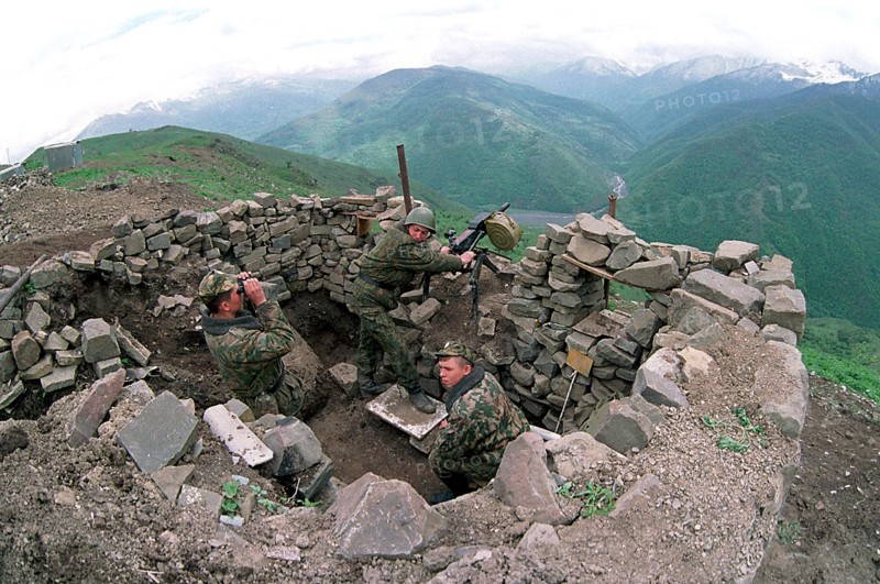 Such self-made shelters of chopped stones prevent russian border guards of itum-kala detachment from militant fire, the detachment keeps a sight on the 80 km long section in argun gorge, defending this high mountain area from chechen militants, for the last half of the year russian soldiers eliminated 4 bases, ammunition depot, 50 mititants' shelters, chechnya, russia, june 27, 2000.