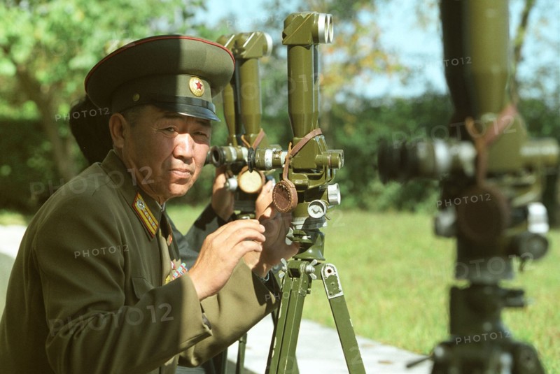 North korean border guard on the frontier with south korea at an observation post, 2002.