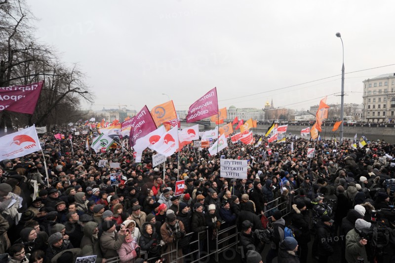 Moscow, russia, december 10, 2011, people attend an authorized rally 'for honest elections' in moscow's bolotnaya square to protest against electoral fraud at recent elections to the state duma.