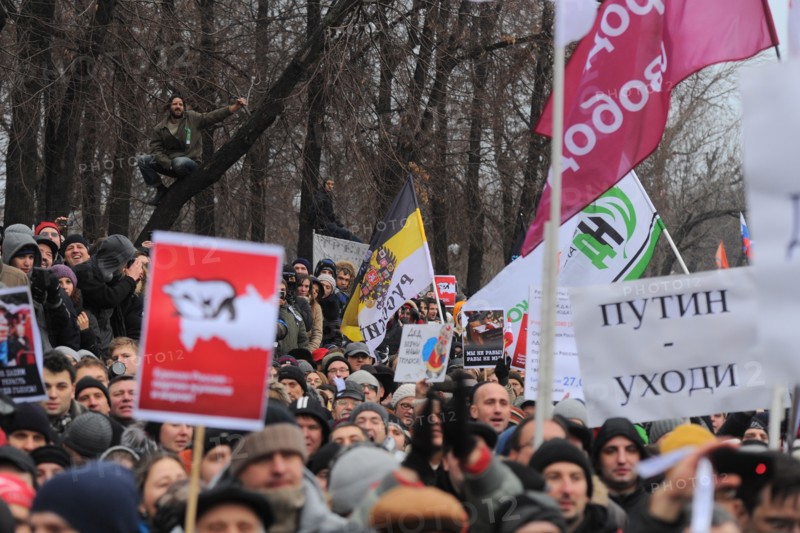 Moscow, russia, december 10, 2011, people attend an authorized rally 'for honest elections' in moscow's bolotnaya square to protest against electoral fraud at recent elections to the state duma.