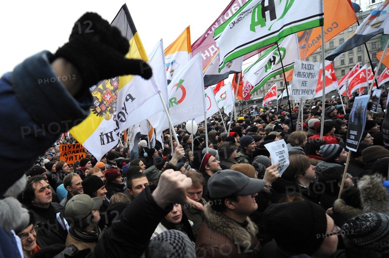 Moscow, russia, december 10, 2011, people attend an authorized rally 'for honest elections' in moscow's bolotnaya square to protest against electoral fraud at recent elections to the state duma.