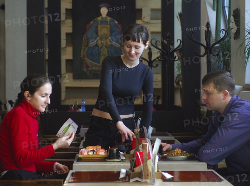 Visitors to the little japan restaurant, moscow, russia, february 2006.