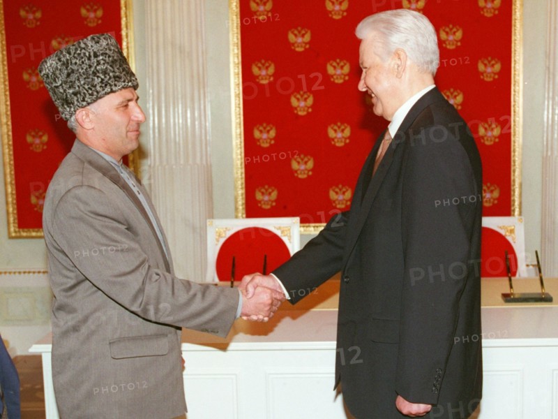 A treaty on peace and principles of mutual relations between the russian federation and the chechen republic of ichkeria has been signed today, on may 12, 1997 by president boris yeltsin and chechen leader aslan maskhadov, the picture shows the presidents shaking hands after the signing.