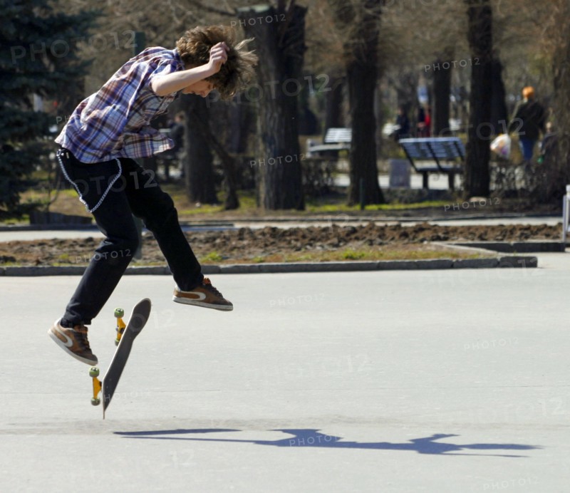Skateboarder in a park in moscow, russia, may 2008.