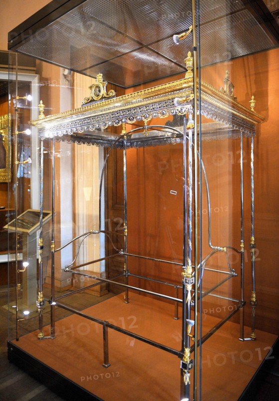 Moscow, russia, march 5, 2009, the cradle in which alexander romanov (the future russian tsar alexander i) is thought to have slumbered in his early years, on display at the armoury (armory) chamber, kremlin, moscow.