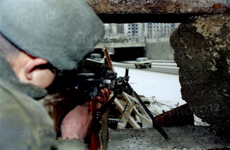 In connection with the tragic accident in daghestan additional security measures were introduced in the city of grozny - the capital of the chechen republic, picture shows a soldier of the internal forces at the checkpoint 'minutka' where terrorists badly wounded general romanov last autumn, january 19, 1996.