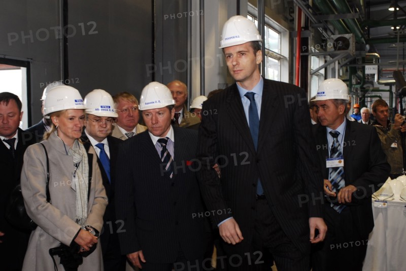 Lipetsk region, russia, may 15, 2009, polyus gold chairman and onexim group president, mikhail prokhorov, lipetsk region governor, oleg korolev, (r-l, centre) and other officials visit yelets power station.