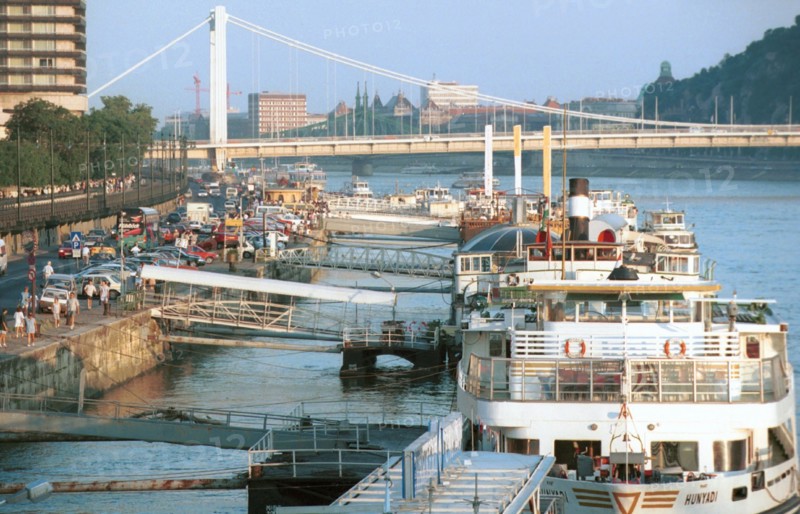 Tour boats on the bank of the danube river, budapest, hungary.