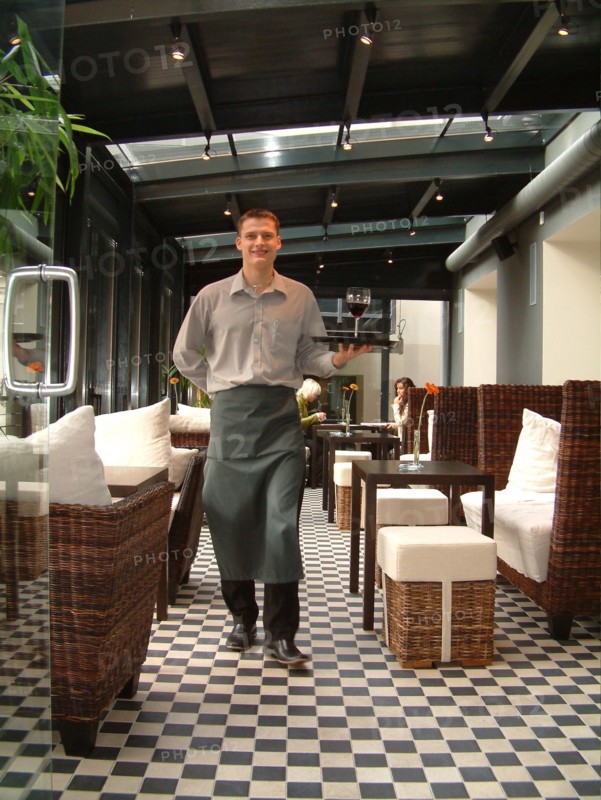 A waiter of the restaurant of the hotel bergs, riga, latvia, 2003.