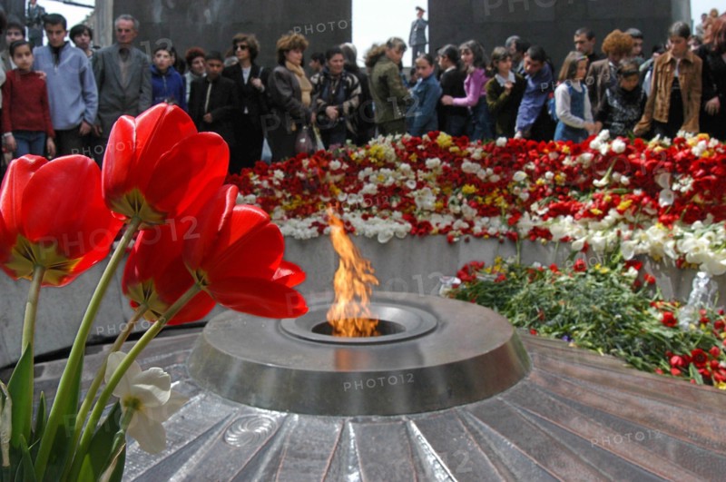 The day of memory of the victims of the 1915 genocide of armenians by the ottoman empire is being marked friday in armenia and in all the armenian communities of the world,thousands of people with flowers come to the eternal flame, a memorial to the victims of genocide, 4/24/03.