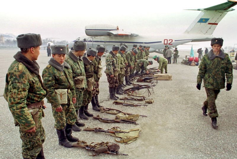 Tajikistan, february 4, 2001, kazakh battalion pictured at the dushanbe airport prior to their departure for homeland, on sunday, the unit of kazakh border guards have ended their peacekeeping mission on guarding jointly with the russian border guards one of the sectors of the tajik-afghani border, since 1993 the kazakh battalion has lost over 20 servicemen, who were killed in fights with tajik and afghani mojaheds.