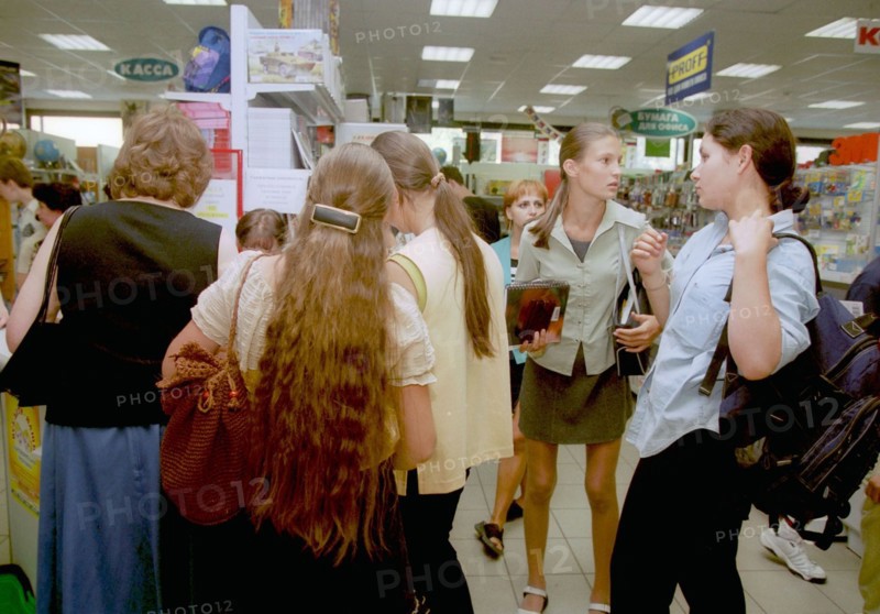 Moscow high school students shopping in a school supply store on new arbat street, moscow, 2002.