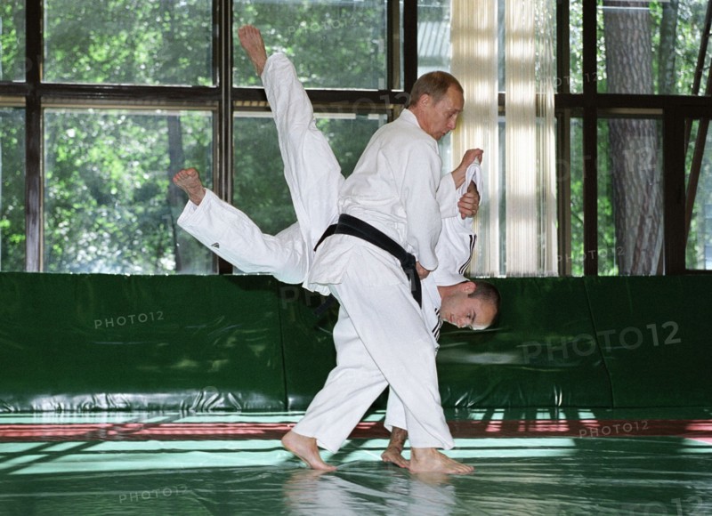 Russian president vladimir putin training in sambo wrestling in novo-ogaryovo presidential residence in june, 2002.