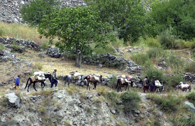 Russian border guards of kalaikhumb command, tajikistan, october 14, 2002, dwellers of nusai settlement (in pic) came close to the border seeking shelter from intensified military operations on afghan side of the frontier line,russian border guards of kalaikhumb command were put on alert, they closely follow the development of the situation.