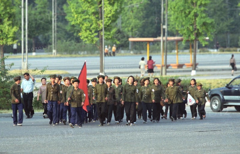 Korean people's democratic republic,, october 17 2002: young pioneers of north korea pictured marching along the streets of pyongyang,the capital of the kpdr under the red flag , (photo itar-tass/ boris kavashkin).