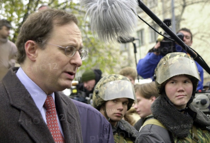Moscow,russia, october 25, us amabssador to russia alexander vershbow (l) pictured near in the building of the palace of culture of the ball-bearing plant where terrorists have taken hostage about 700 people.