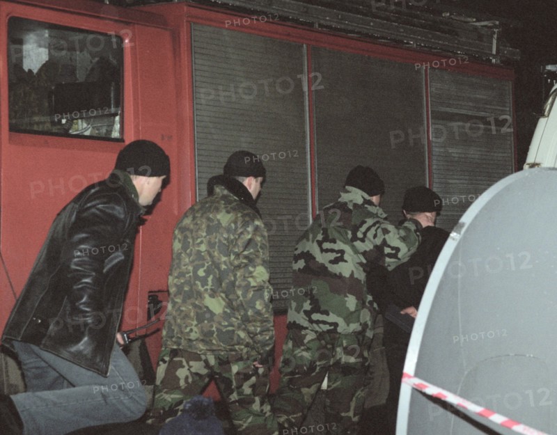 Moscow, russia, october 26 2002: chechen hostage crisis: an arrested terrorist (r), in the course of the operation to release the hostages 34 terrorists were killed, two arrested.
